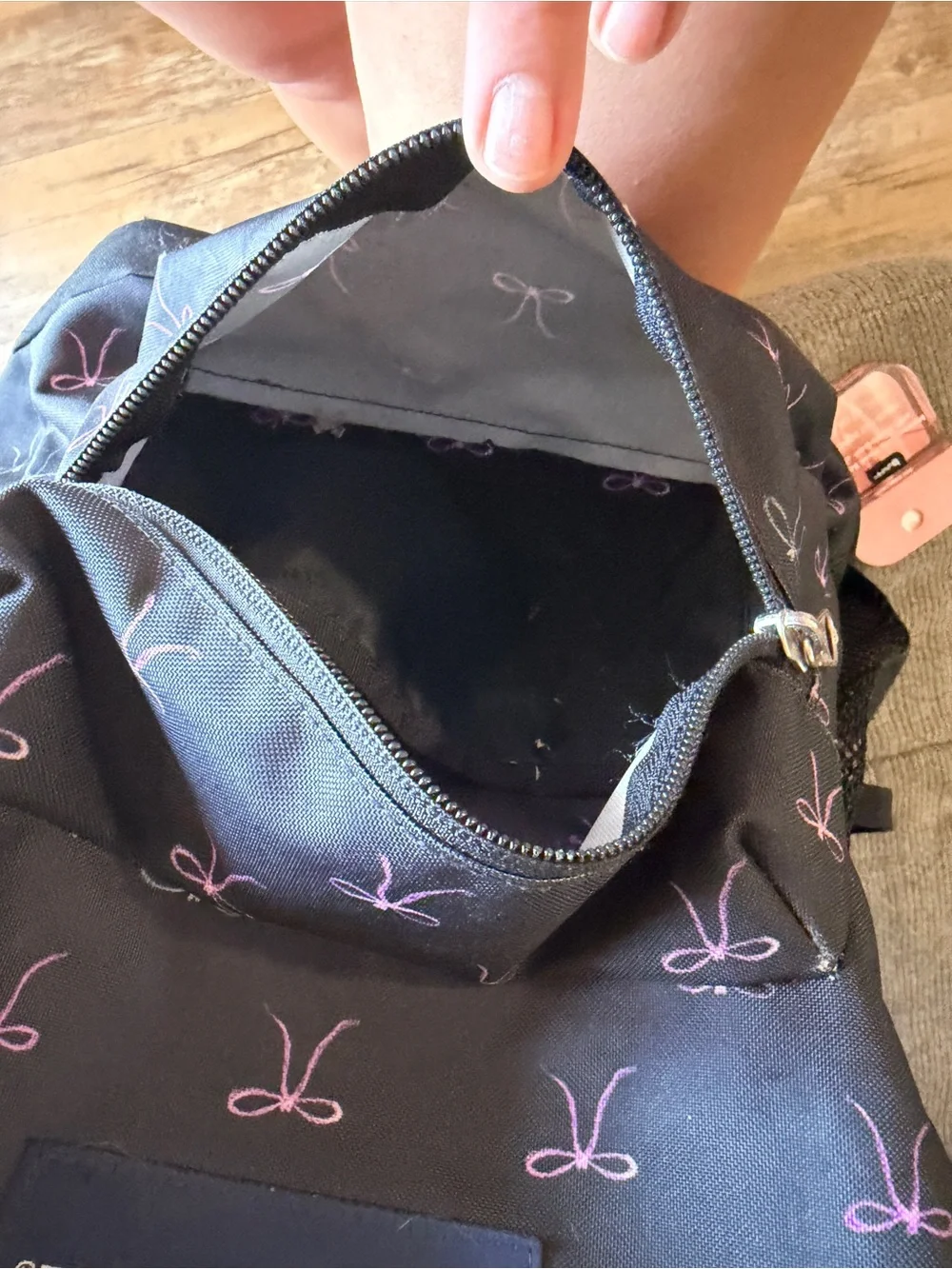Jansport Black Backpack with Pink Bow Print